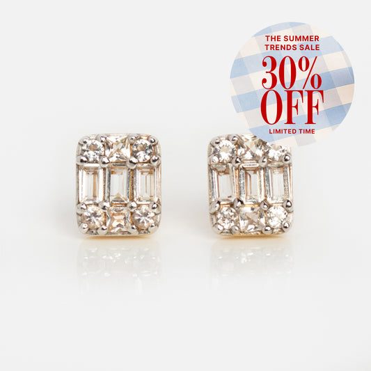 A pair of Solid Gold Art Deco Studs with clear gemstones is displayed on a white background. A circular sticker reads: The Summer Trends Sale, 30% Off, Limited Time. Elevate your style with these vintage gold earrings.