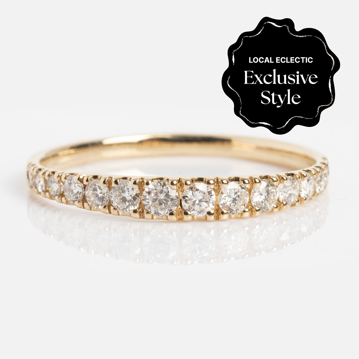 The Echo Diamond Band features a thin gold band set with sparkling white diamonds totaling 0.46 ctw. A decorative badge in the corner notes it as a Local Eclectic Exclusive Style. The ring is shown on a white background.