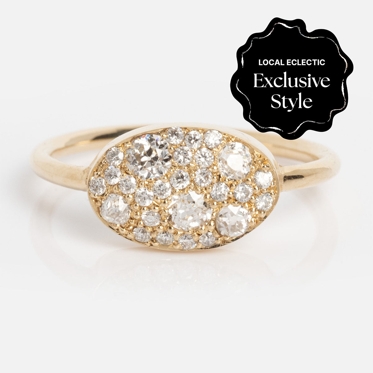 The "Eternal Flame" Soul Ring is a gold ring featuring an oval-shaped top set with brilliant-cut diamonds, shown on a white background. A black label states Local Eclectic Exclusive Style. Band width: 1.5 mm.