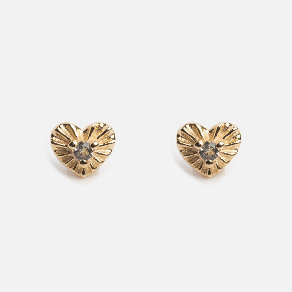 Solid Gold Heart Flat Back Studs featuring engraved details and a small clear gemstone at each center, shown on a white background.