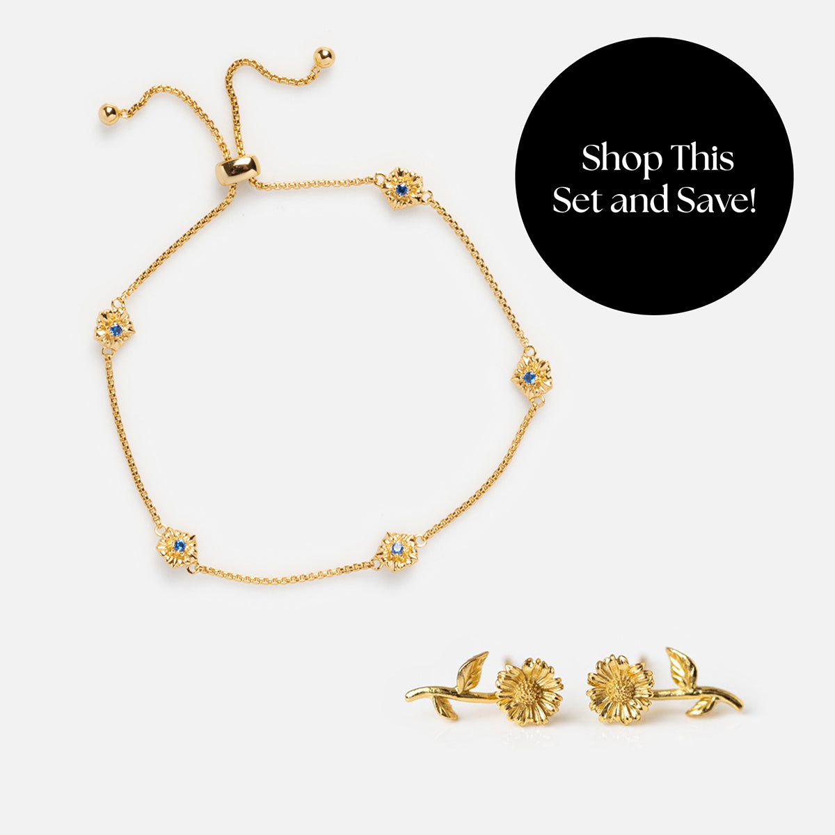 A gold chain bracelet with birth flower charms and matching earrings from the Birth Flower Gift Set are shown on a white background. A black circle shows "Shop This Birth Flower Gift Set and Save!" in white text.