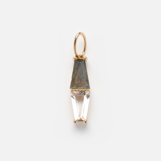 The Solid Gold Toi et Moi Labradorite and White Topaz Charm Sample features a faceted white topaz above a triangular gray labradorite, both set in minimalist 9k solid yellow gold with a loop for attaching to a chain.