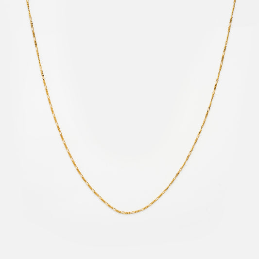 The Solid Gold Chain for Charms is a delicate, thin necklace displayed on a plain white background, forming a gentle curve.