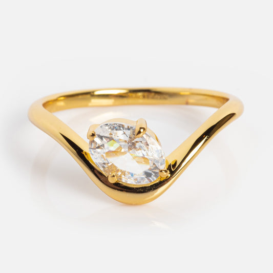 The Floating Gem Ring features a marquise-cut clear gemstone set on a modern V-shaped band with a 14k yellow gold plated finish, embodying Local Eclectic style. Displayed on a plain white background.