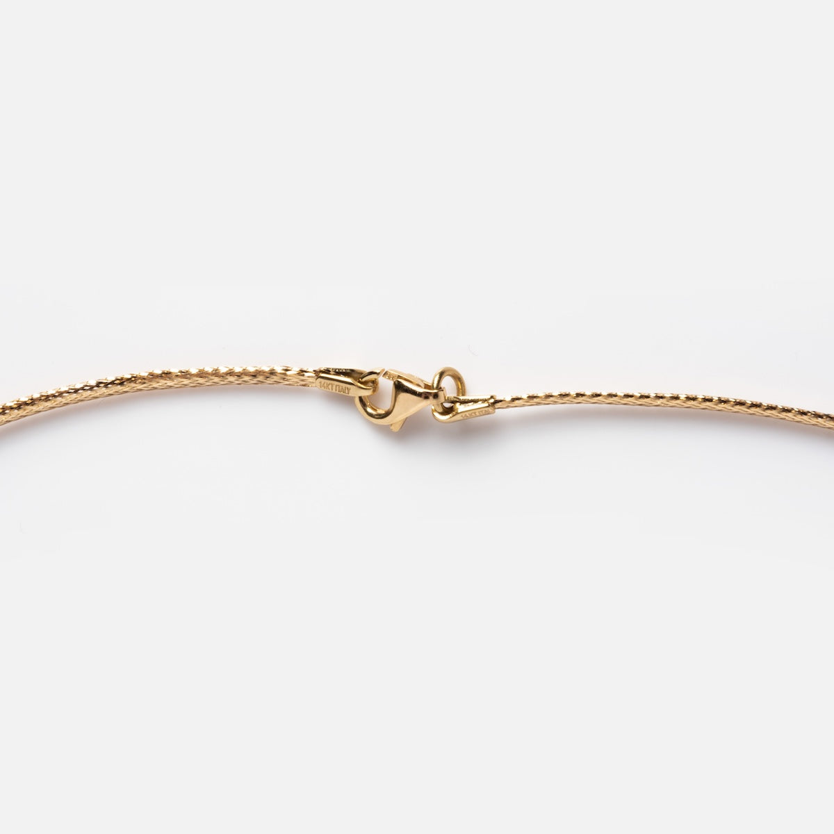 Closeup of Family Gold Solid Gold Slim Mesh Necklace closure