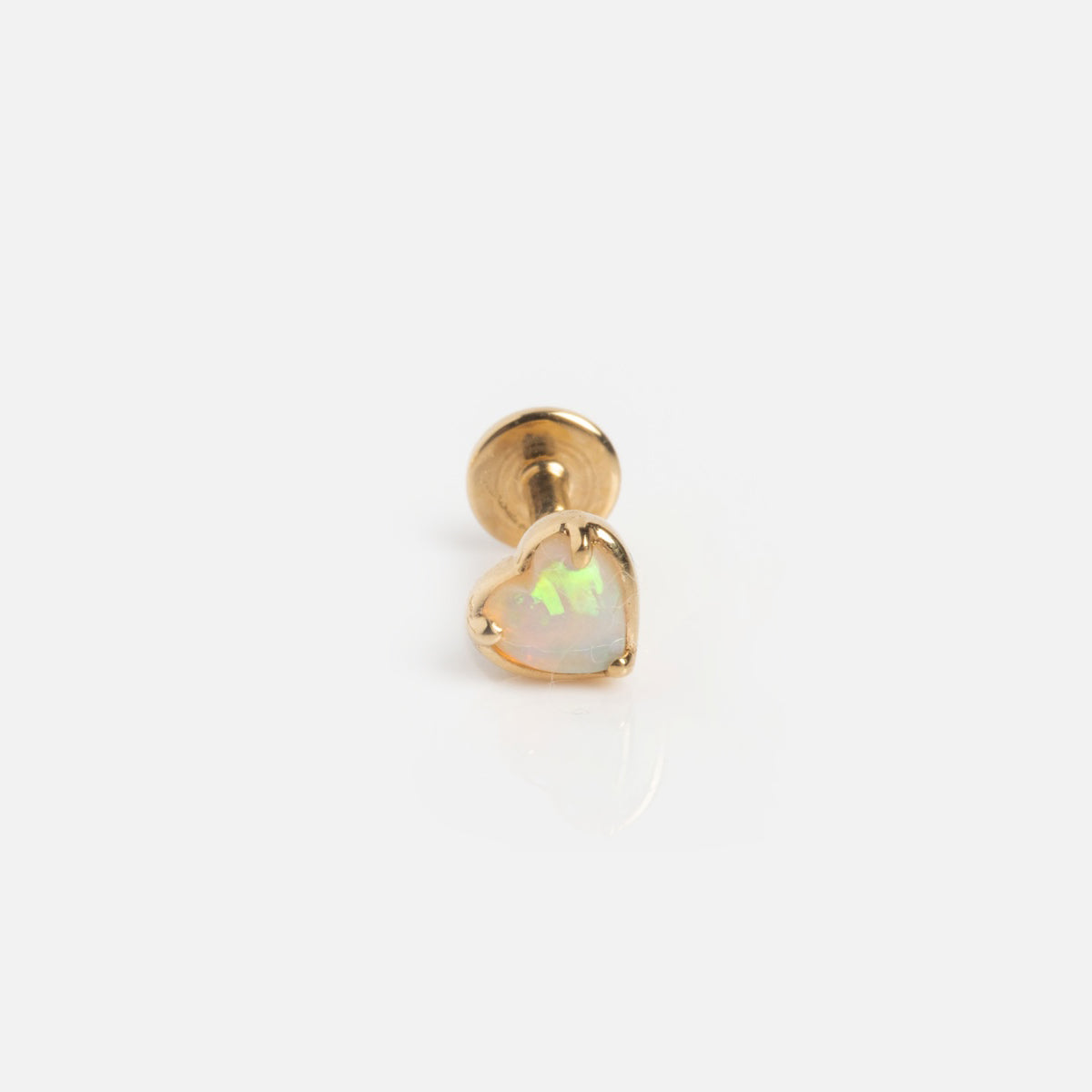 The Solid Gold Flat Back Studs Opal Heart Sample is a 3.5 mm heart-shaped Australian opal earring, crafted from 9k solid yellow gold and shown against a plain white background.
