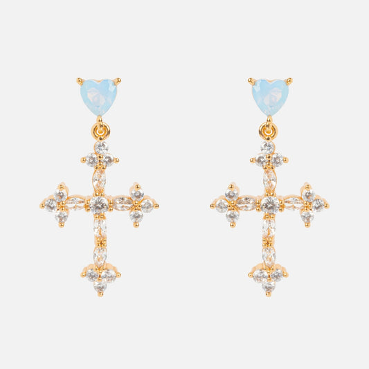 The Serendipity Cross Dangle Earrings Sample features 18k yellow gold plating, blue heart-shaped studs, dangling CZ-adorned crosses on a brass base, displayed against a white background.