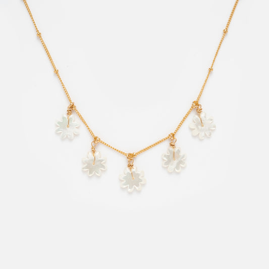 Mother of Pearl Flower Shaker Necklace Sample: Features a gold filled chain with five handmade white mother of pearl flower charms, evenly spaced along the chain and shown on a plain white background.