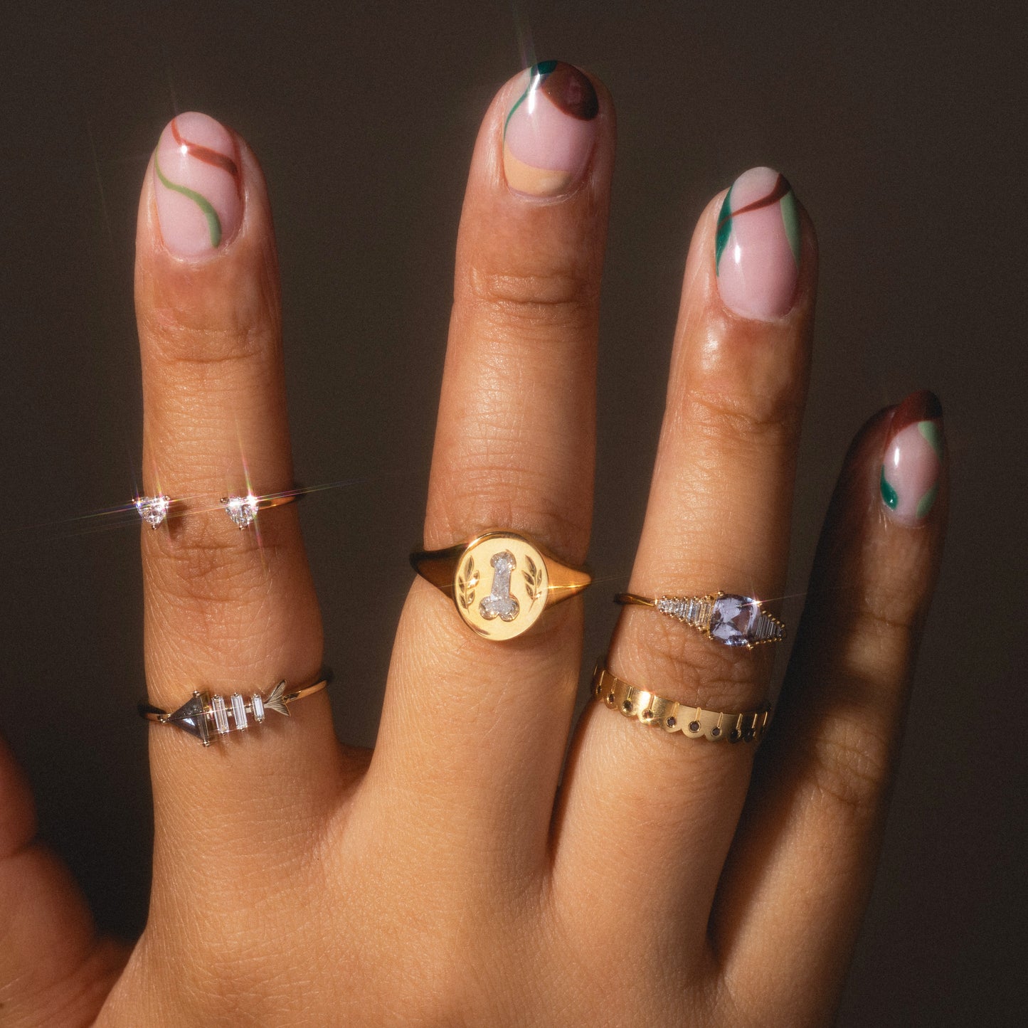Gold Fish Bone Ring with Triangle and Baguette Cut Diamond