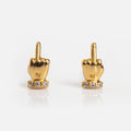Meet the Boy Bye Earrings: gold plated studs shaped like hands with raised middle fingers, accented with clear cubic zirconia at the base—bold earrings designed to make a daring statement.