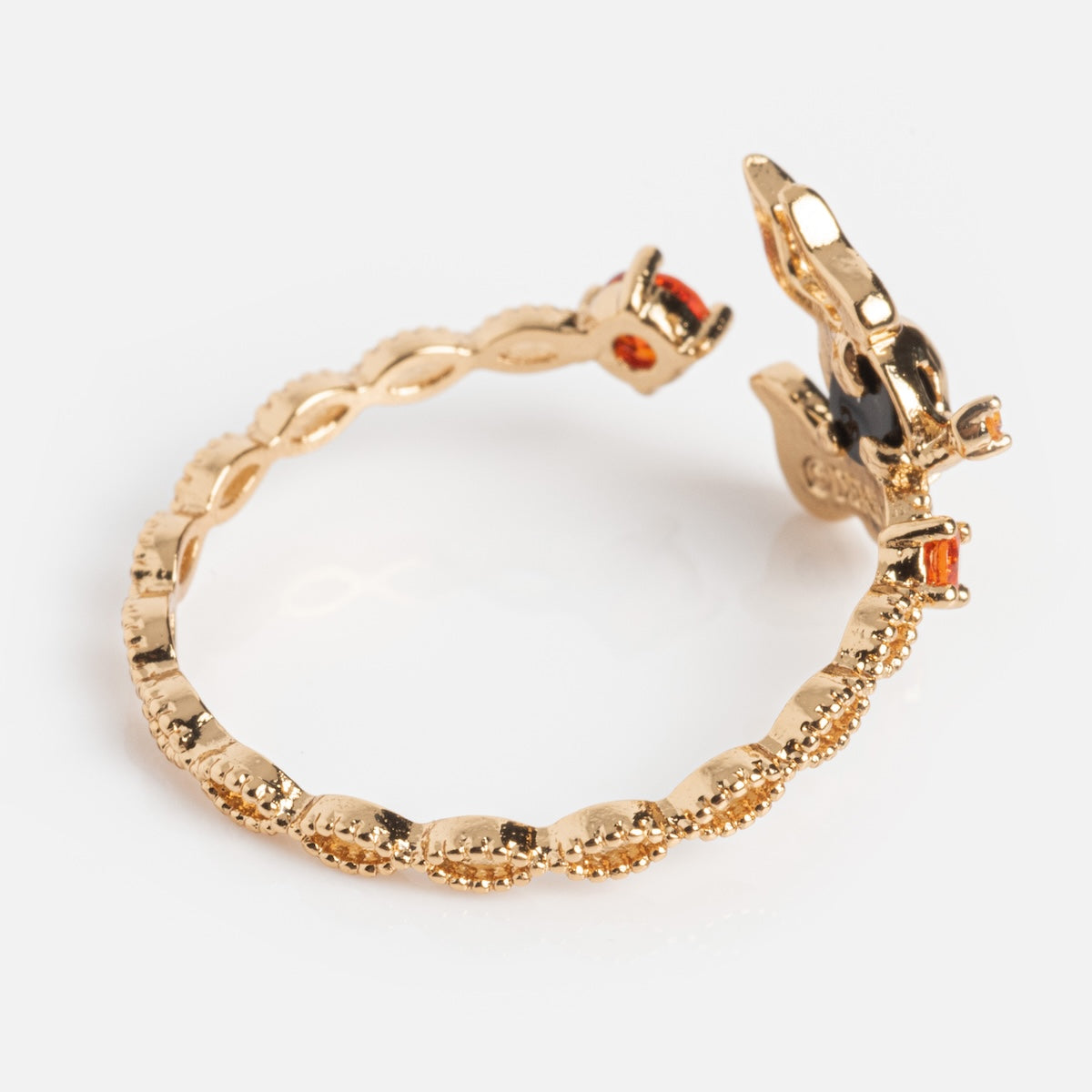 The Disney Zero Adjustable Ring features a gold textured, snake-shaped band with a detailed head and tail, accented by orange gemstones on the eyes and body. Its beaded pattern adds extra charm to this intricate Disney jewelry piece.