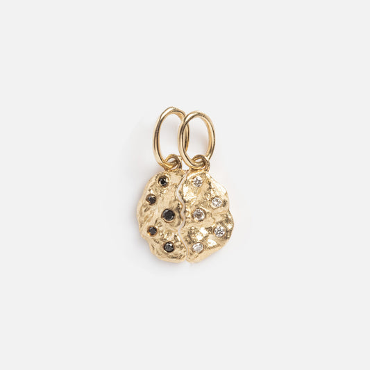 The Levain Bakery x Local Eclectic Solid Gold Share a Cookie Friendship Charm features two small, textured gold charms with clear and dark stones, each on a gold loop—ideal as solid gold friendship charms on a white background.