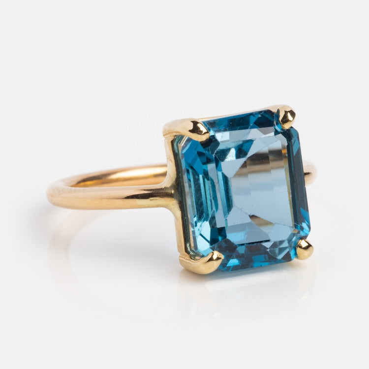 Buy Halo Blue Topaz Birthstone Diamond Ring Online | CaratLane