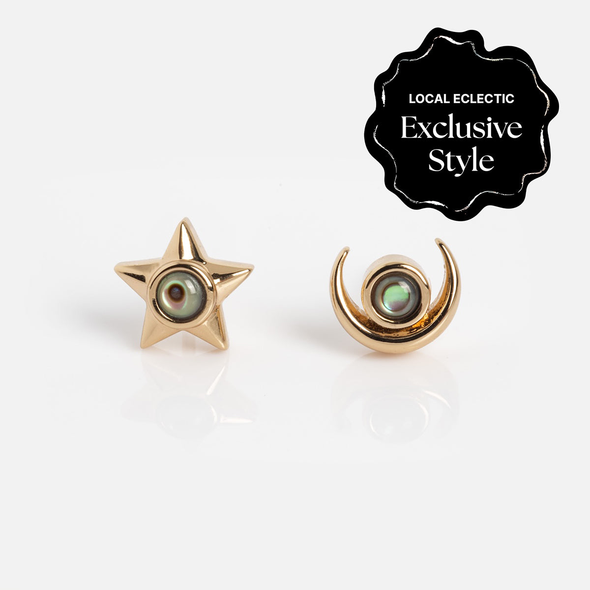 Lucky Star and Moon Studs: 14k yellow gold plated stud earrings—one star, one crescent moon—each with a round abalone detail at the center. Local Eclectic Exclusive Style.