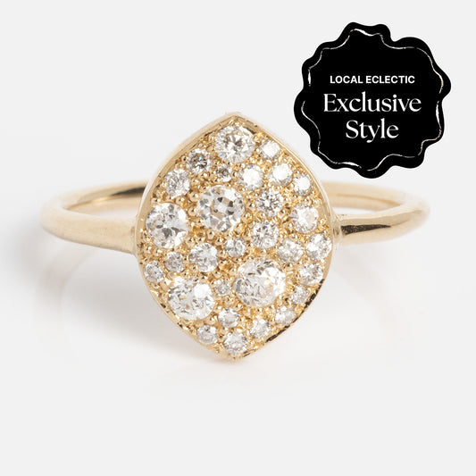 The "My Beloved" Soul Ring features a marquise-shaped gold setting adorned with multiple brilliant-cut gemstones, displayed on a white background. A corner badge reads “Local Eclectic Exclusive Style.”.