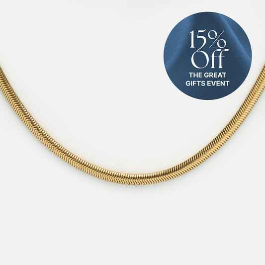 Close-up of the Classic Snake Chain Necklace, gold plated, on a white background. A blue circular label in the top right corner displays "15% Off THE GREAT GIFTS EVENT.