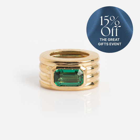 Solid Gold Bold Birthstone Spacer Charm in 9k yellow gold with three stacked bands and a rectangular green gemstone. Blue circular label: 15% Off THE GREAT GIFTS EVENT.