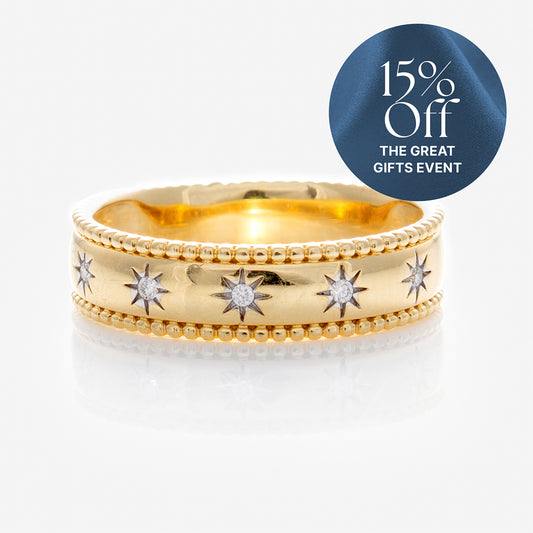 The Solid Gold Bold Star Set Diamond Band features star-set diamonds and beaded edges, displayed on a white background. A blue circle in the top right corner reads “15% Off THE GREAT GIFTS EVENT.”.