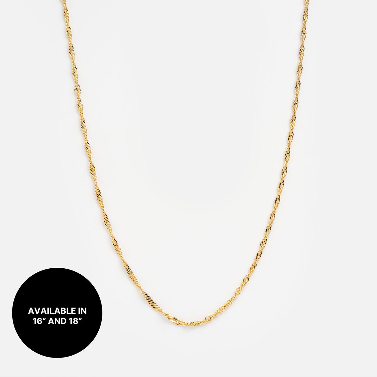 Chain For Charms gold rope necklace displayed on white background. A black circle in the corner reads “AVAILABLE IN 16 AND 18.” Perfect for stacking or solo wear, this timeless gold plated chain adds elegance to any look.