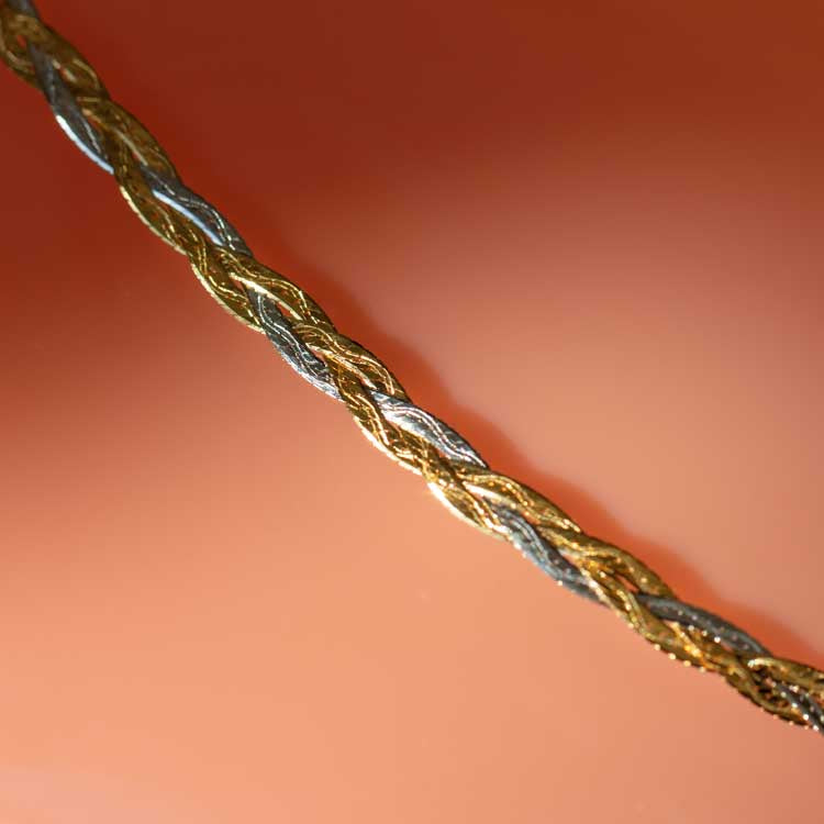 Solid Gold Mixed Metal Braided Bracelet yellow and white gold modern jewelry family gold