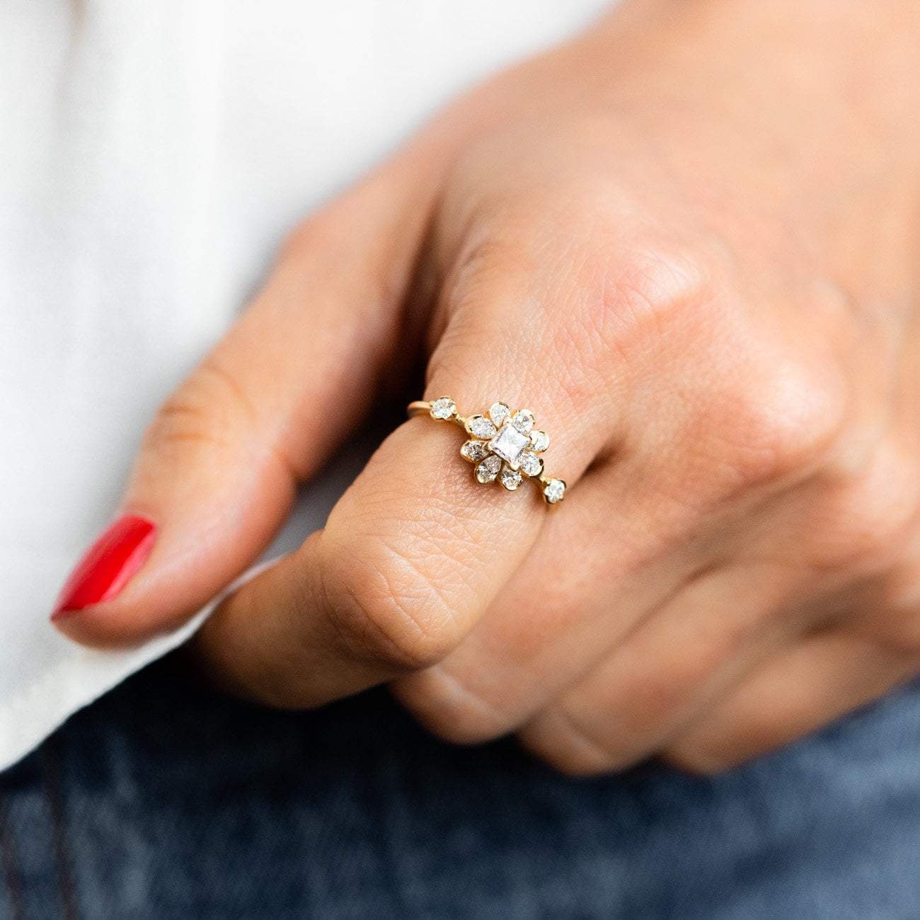 Local Eclectic Gold Diamond Flower Engagement Ring on Finger