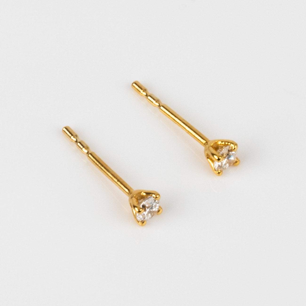 Local Eclectic Tiny Solid Gold Diamond Studs
