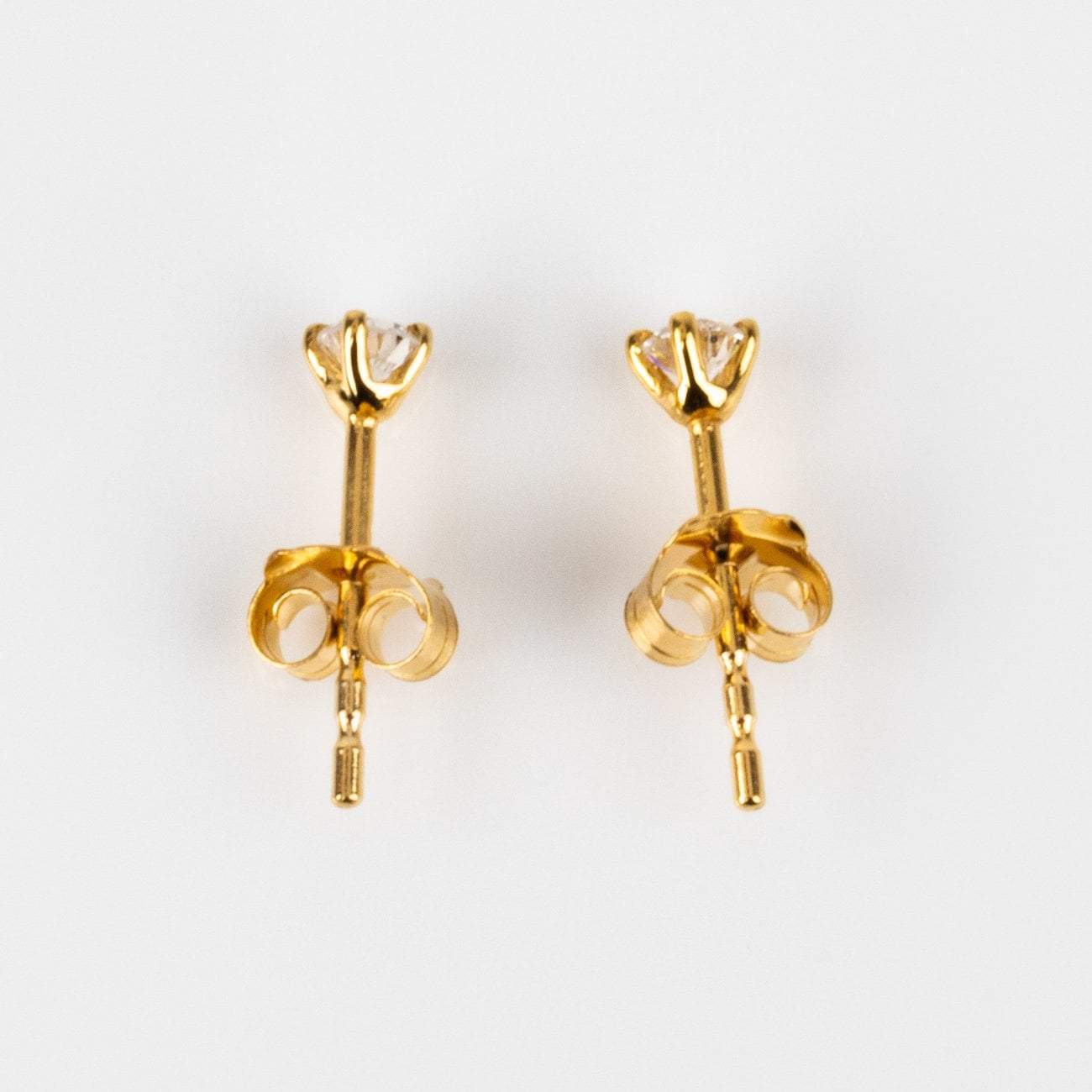 Local Eclectic Tiny Solid Gold Diamond Studs