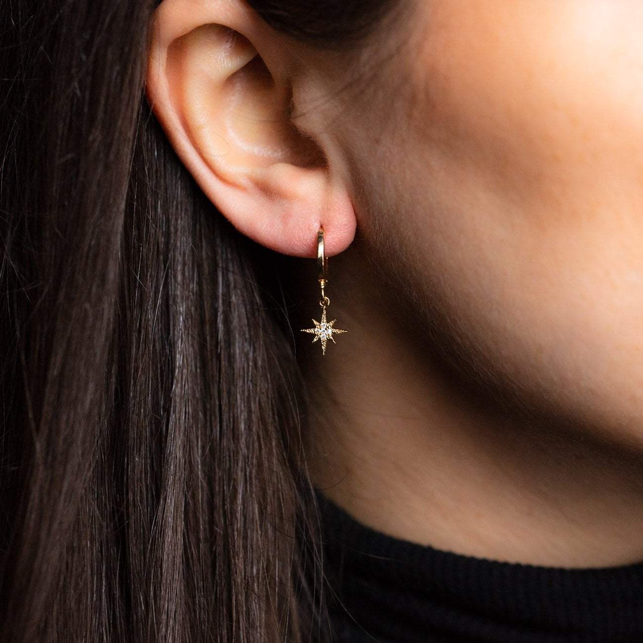 Local Eclectic Gold Star and Moon Hoop Earrings on Ear
