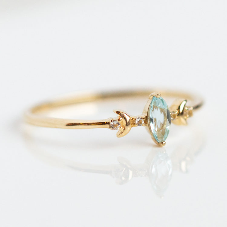 Solid Gold Blue Topaz Crescent Moon Ring for Clarity