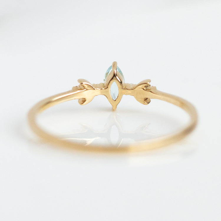 Solid Gold Blue Topaz Crescent Moon Ring for Clarity